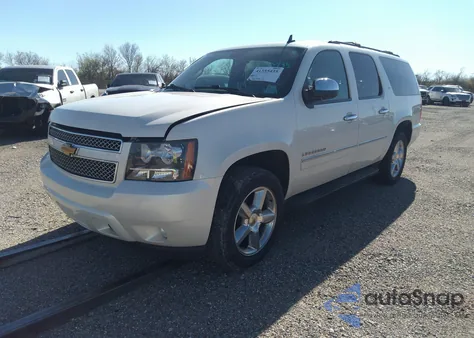 2014 Chevrolet Suburban 1500 Ltz from USA, damaged, VIN 1GNSCKE0XER235343